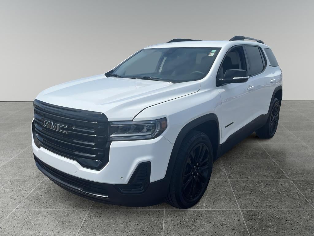 2023 GMC Acadia SLE in Summit White — front three-quarter view