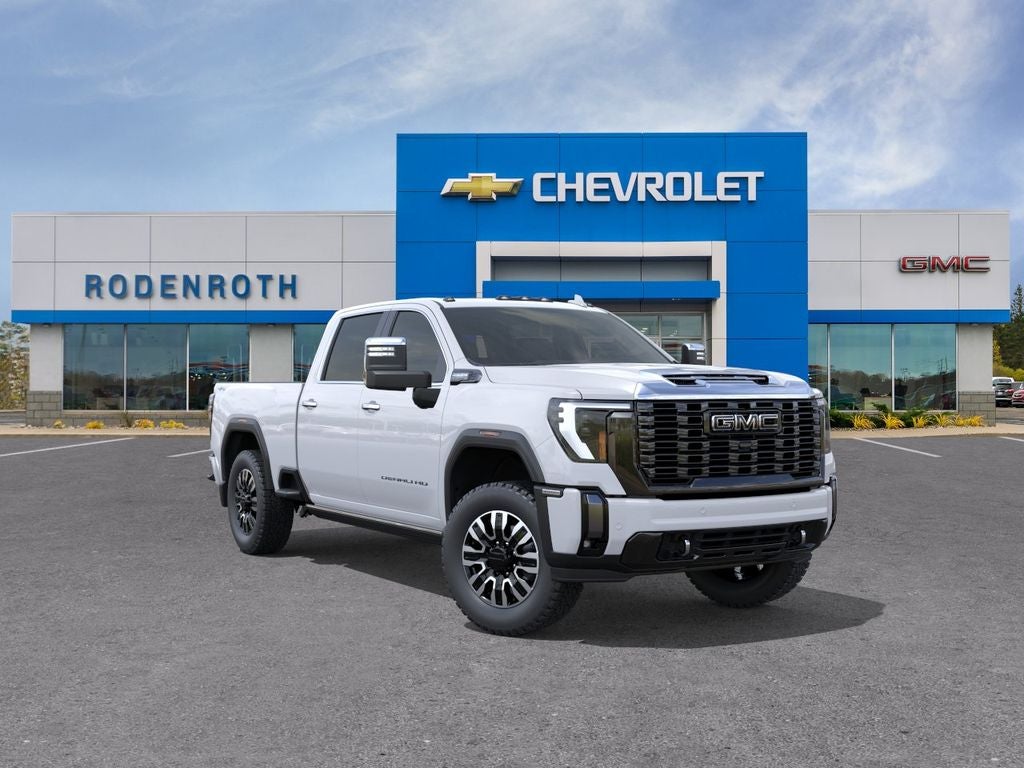 2026 GMC Sierra 3500 HD Denali Ultimate in Glacier White Tricoat — front three-quarter view