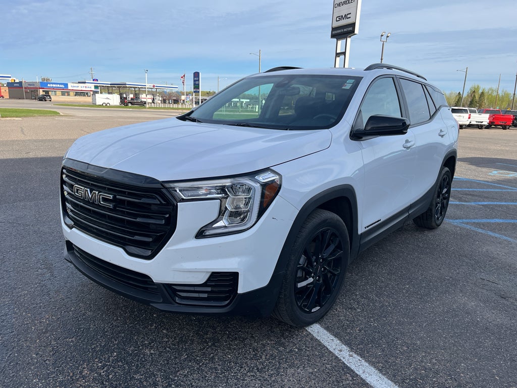 2023 GMC Terrain SLE in Summit White — front three-quarter view