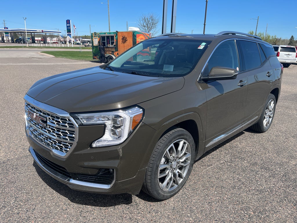 2023 GMC Terrain Denali in Deep Bronze Metallic — front three-quarter view